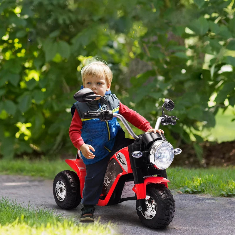 Moto Elettrica per Bambini a 3 Ruote con Luci e Suoni, Batteria Ricaricabile 6V, Velocità 2 km/h, per Bimbi da 18-36 Mesi, 72x57x56cm Rossa DP7370-188V90RDDP7